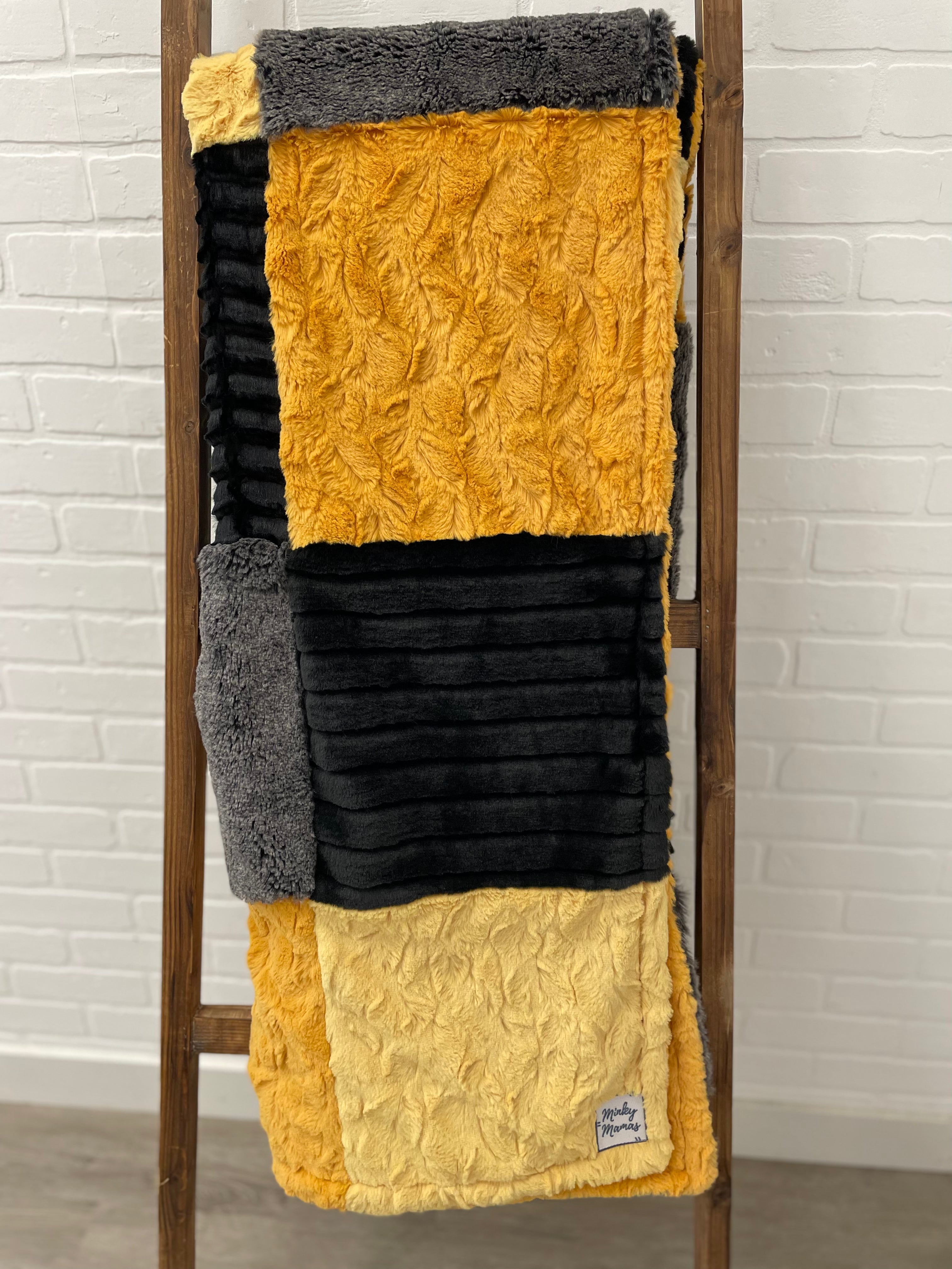 Black and Mango Minky Mama With Bella on the Back
