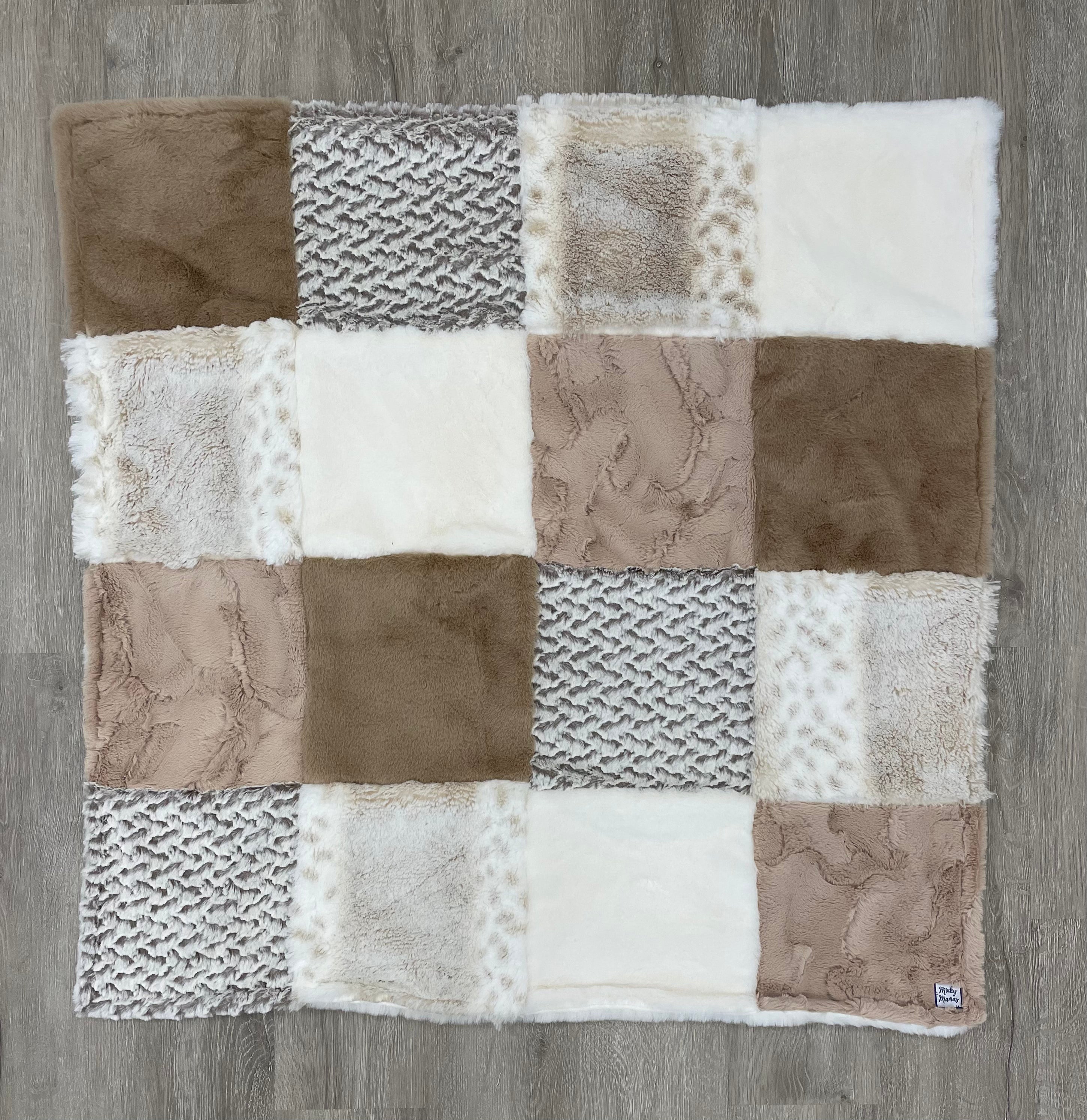 Safari and Off White Infant With Baby Whispy on the Back