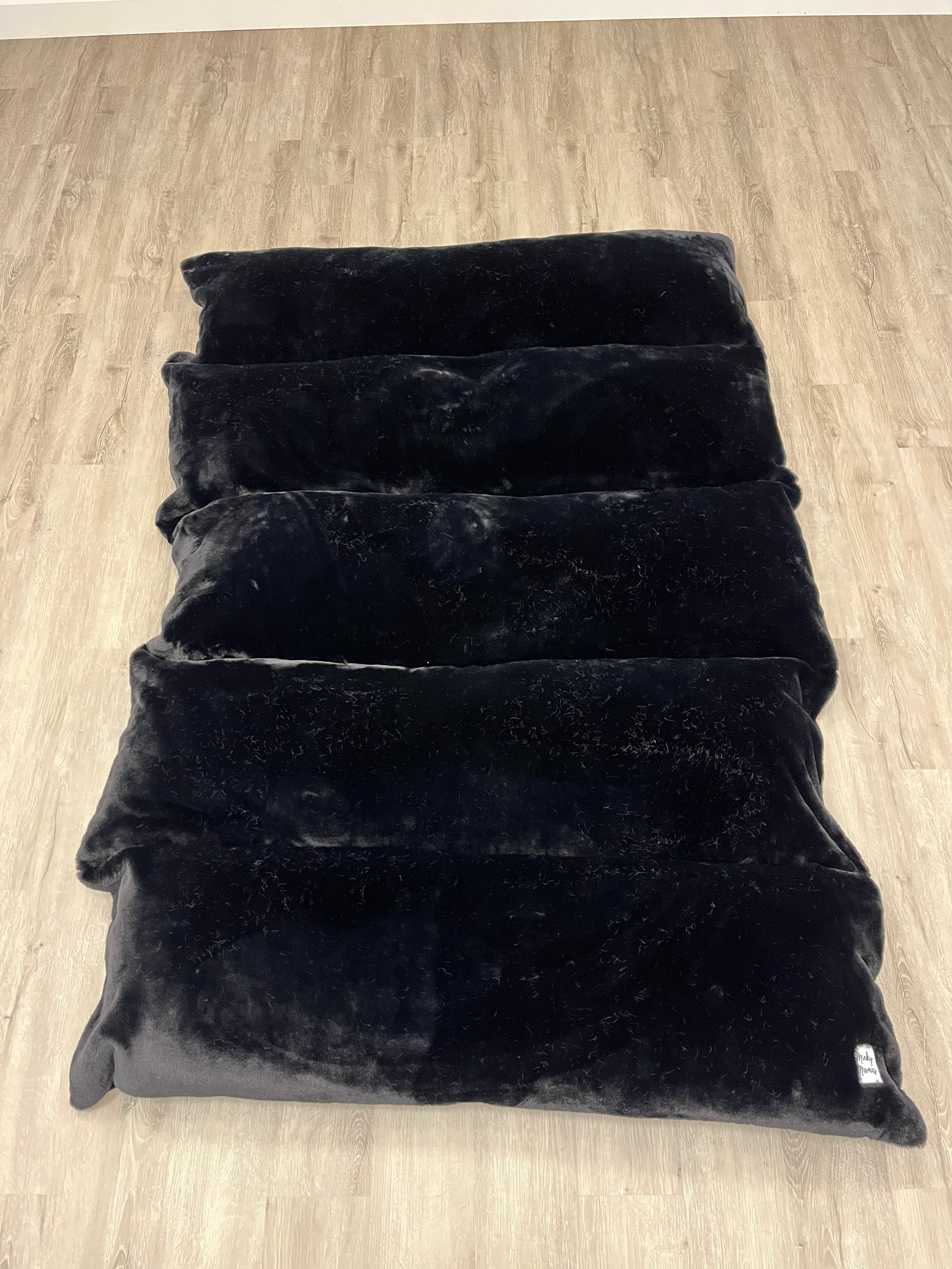 Black pillow bed