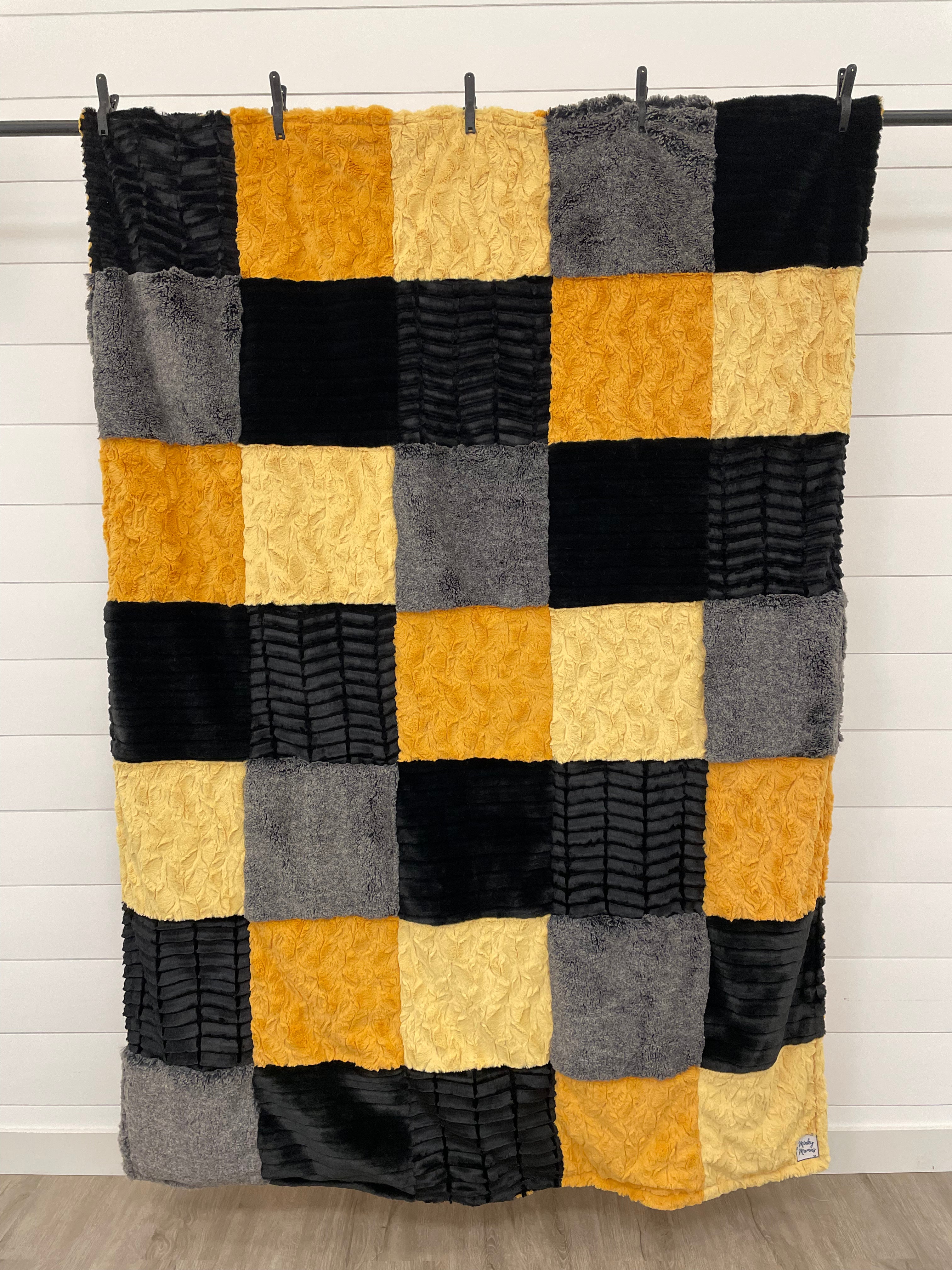 Black and Mango Minky Mama With Bella on the Back
