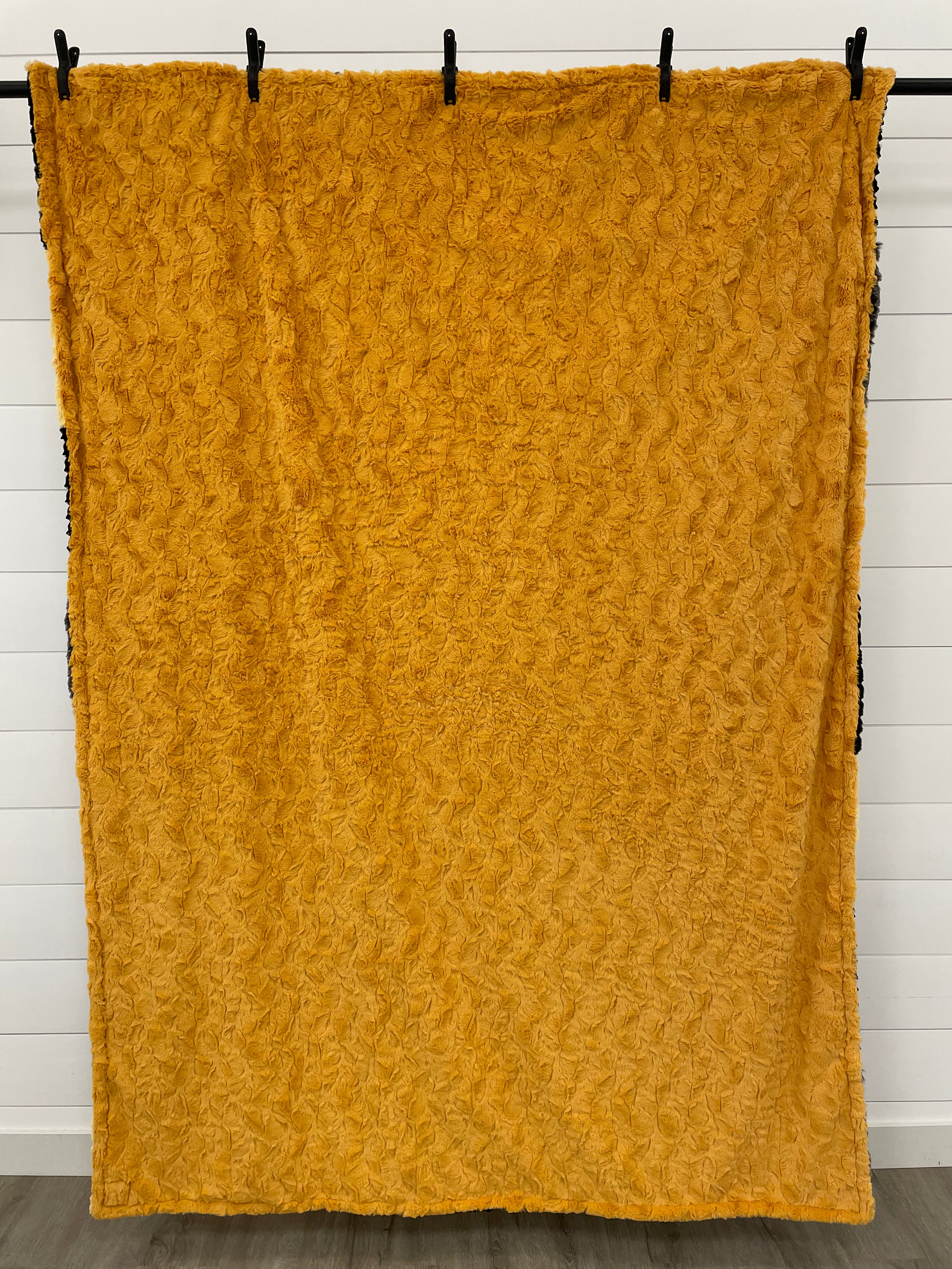 Black and Mango Minky Mama With Bella on the Back