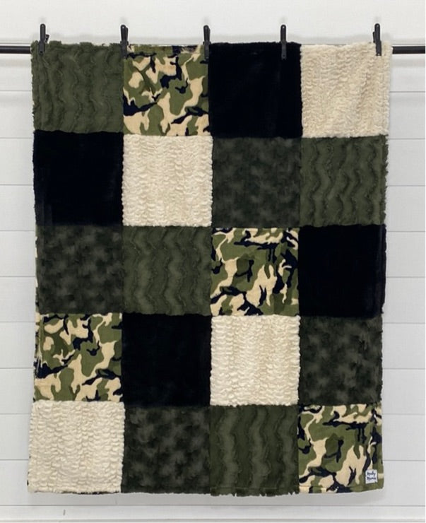 Green, Black and Cream Throw With Green Camouflage on the Back