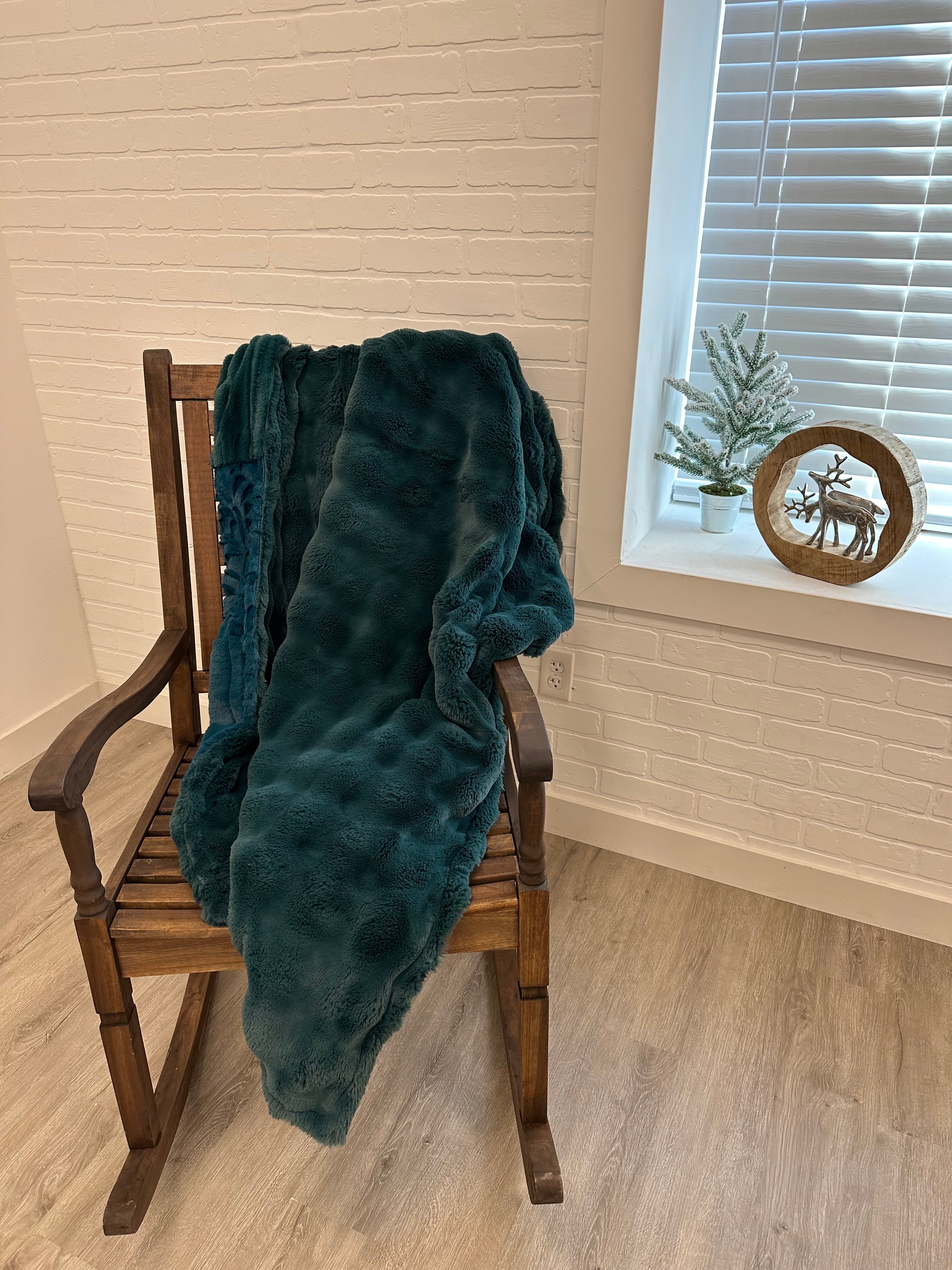 Teal powder puff throw