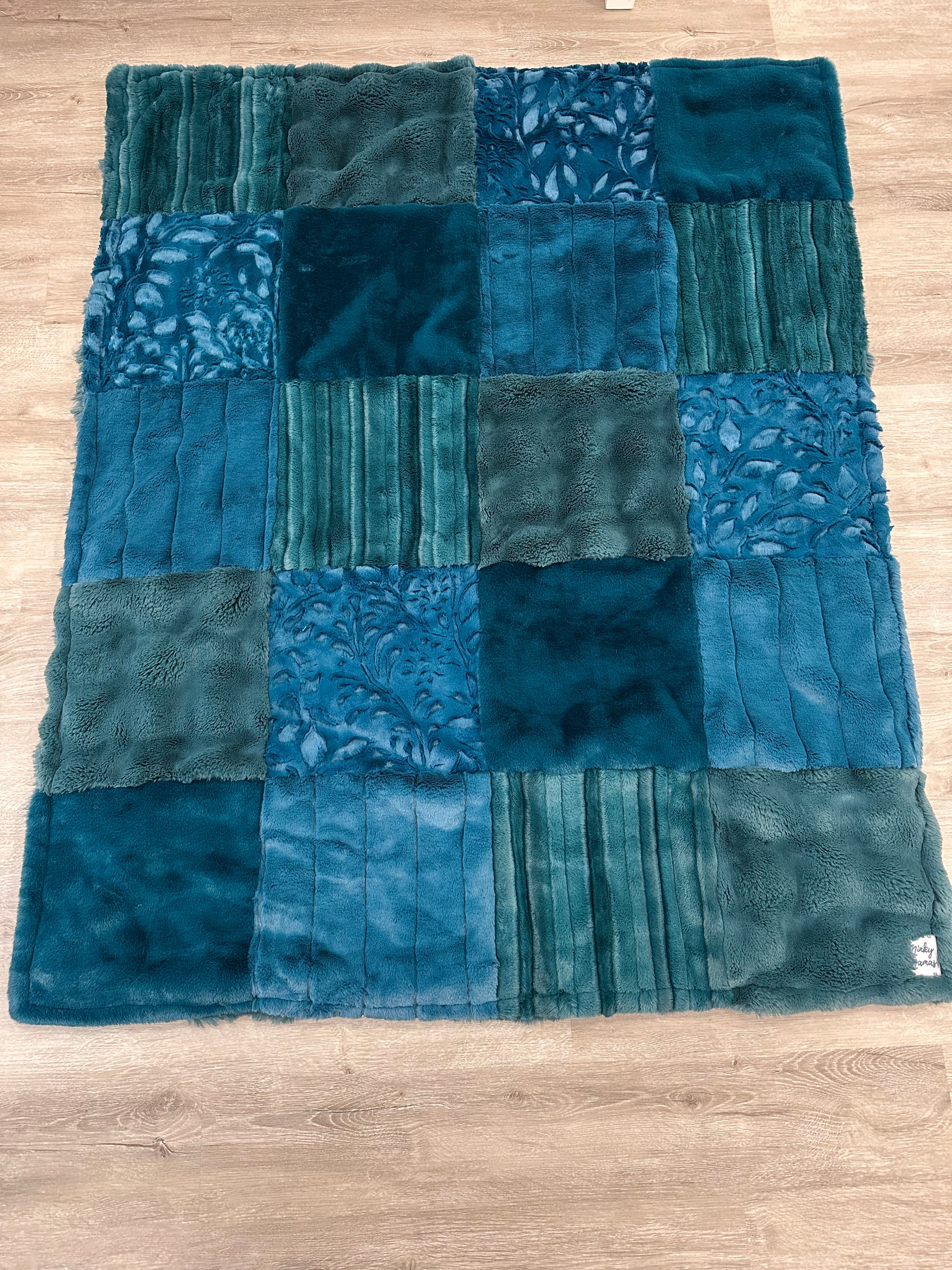 Teal powder puff throw