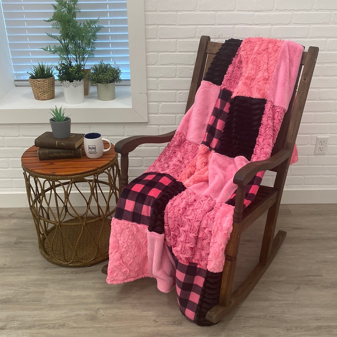 Pink and black online throw