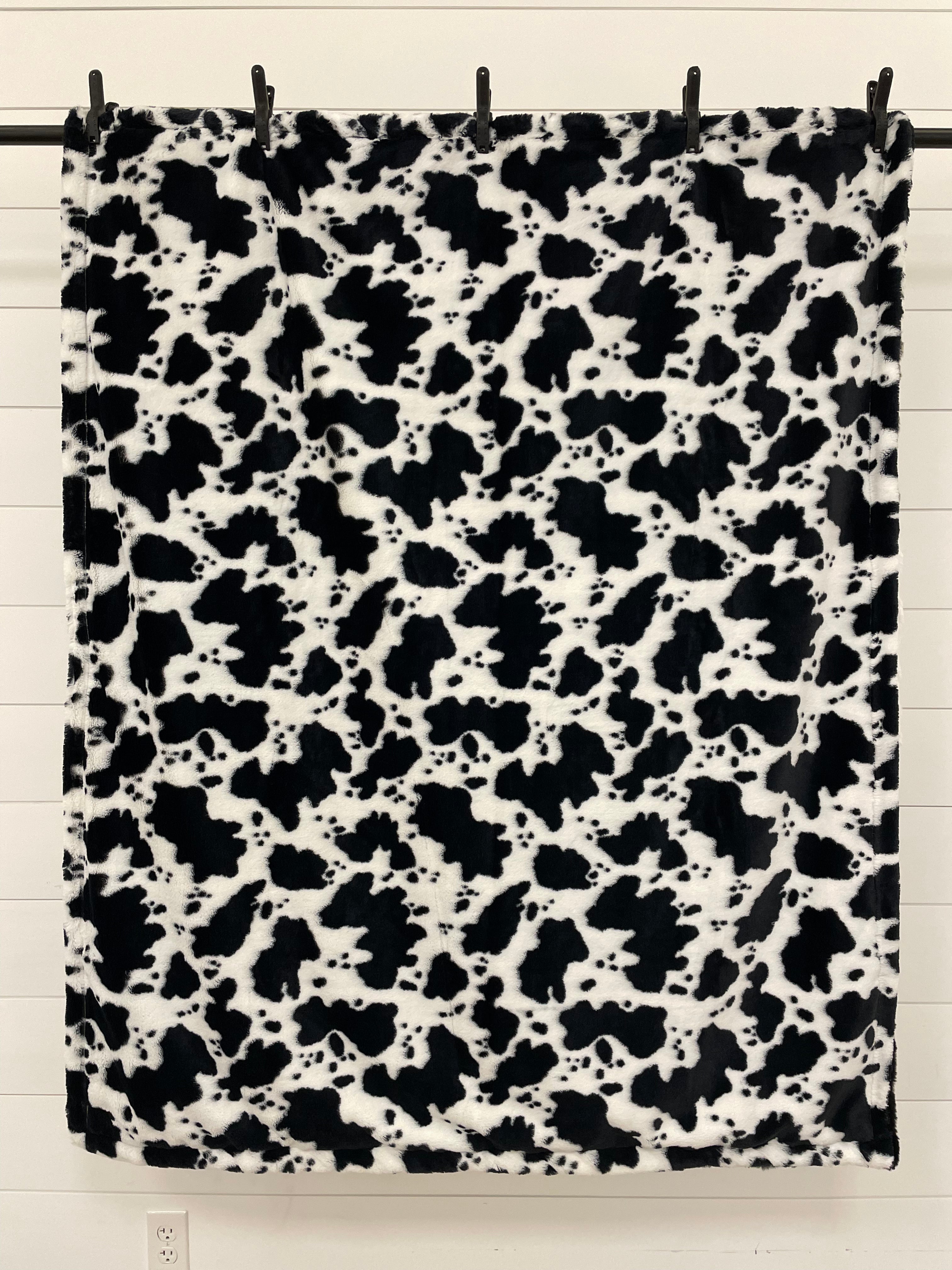 Black, White and Red Throw With Cow on the Back